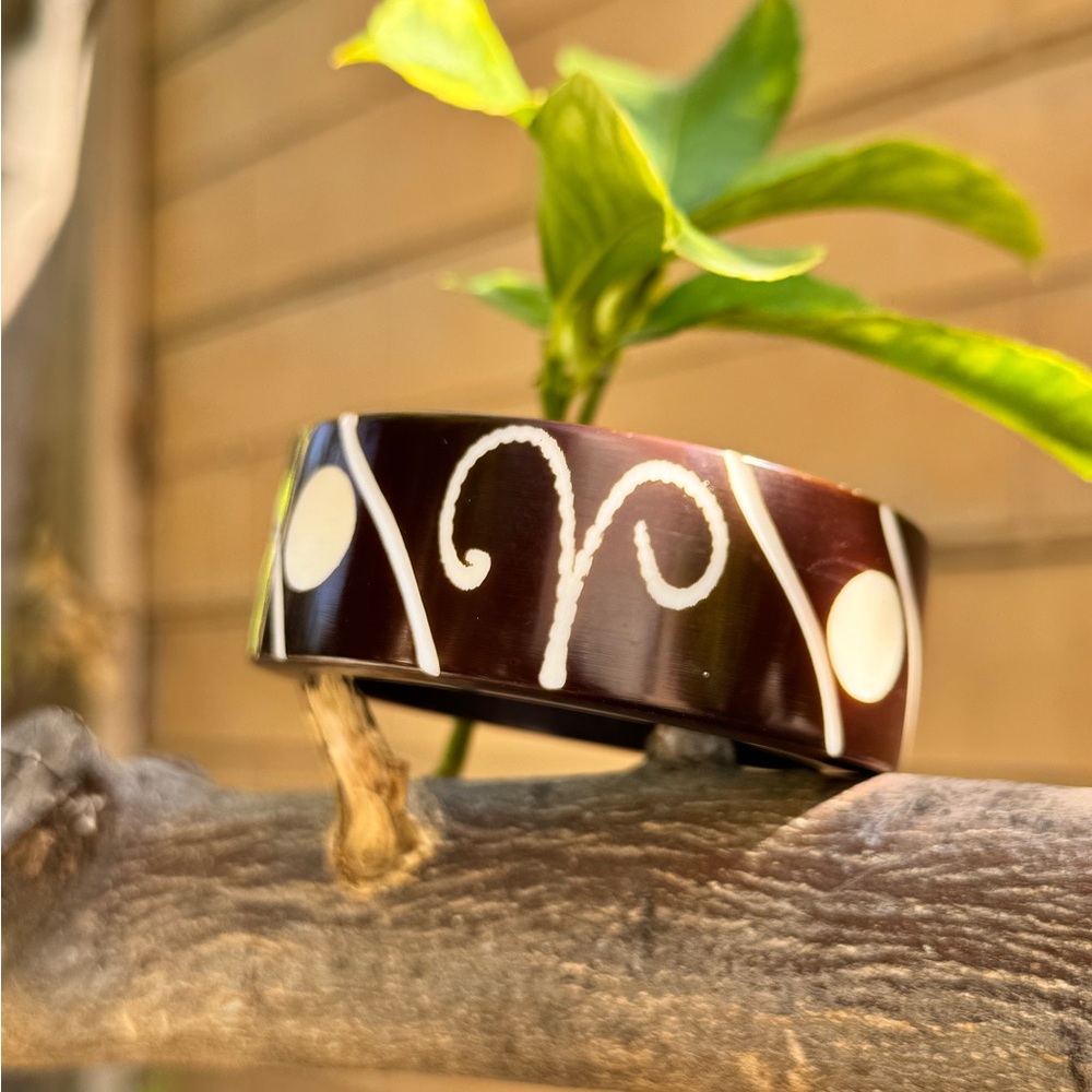 Vintage Hand-Carved Tribal Bangle Bracelet with Inlaid Bone Scroll Design